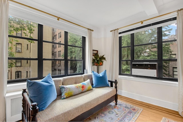 235 E 22nd St Unit 5C, New York City, NY 10010 - sitting room with wood finished floors and cooling unit