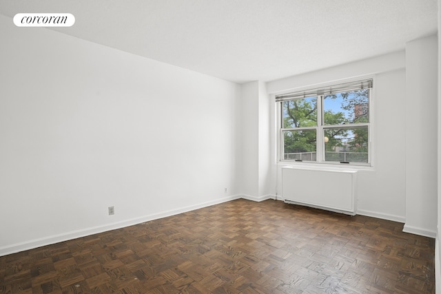 2400 Johnson Ave Unit 1K, New York City, NY 10463 - spare room featuring radiator heating unit and baseboards