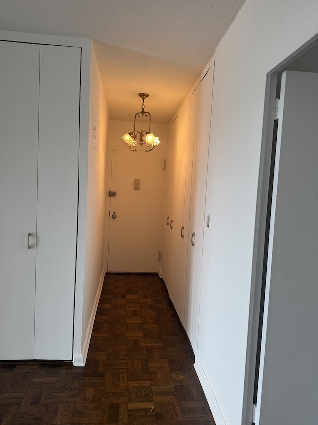 2400 Johnson Ave Unit 1K, New York City, NY 10463 - corridor with a chandelier and baseboards