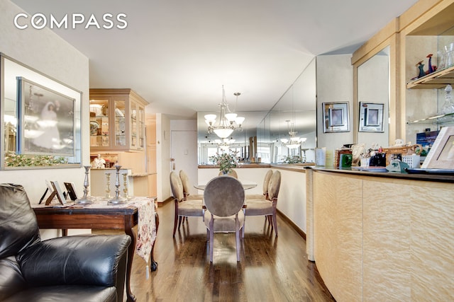 400 E 85th St Unit 15F, New York City, NY 10028 - dining room with a chandelier and wood finished floors