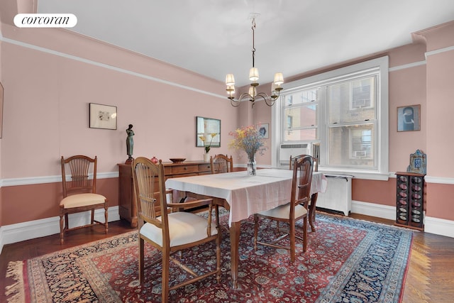 390 Riverside Dr Unit 11E, New York City, NY 10025 - dining space featuring a chandelier, cooling unit, and radiator heating unit