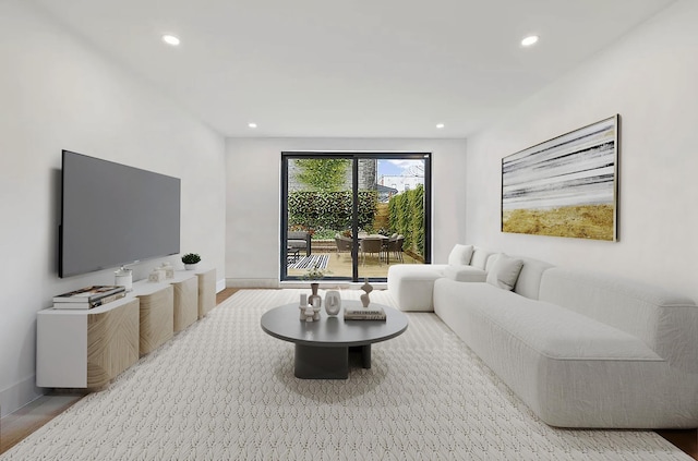 62 Veronica Pl Unit 1-A, New York City, NY 11226 - living area with wood finished floors and recessed lighting