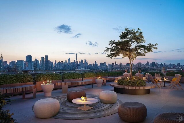 22-18 Jackson Ave Unit 208, New York City, NY 11101 - view of patio featuring a view of skyline