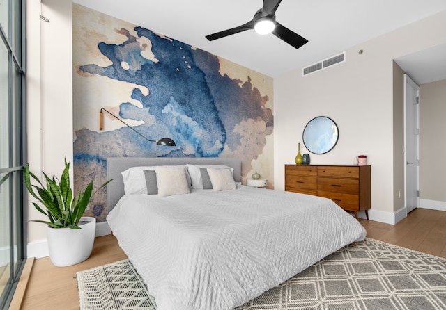 22-18 Jackson Ave Unit 208, New York City, NY 11101 - bedroom featuring wood finished floors and ceiling fan