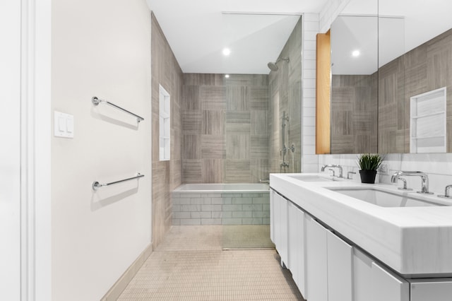 22-18 Jackson Ave Unit 208, New York City, NY 11101 - full bathroom featuring double vanity, tiled shower / bath, tile patterned floors, and recessed lighting