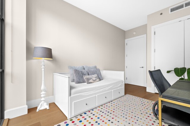 22-18 Jackson Ave Unit 208, New York City, NY 11101 - bedroom featuring wood finished floors and a closet