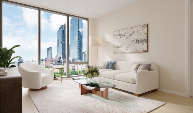 11-36 45th Rd Unit 404A, New York City, NY 11101 - living room featuring floor to ceiling windows, a view of skyline, and wood finished floors
