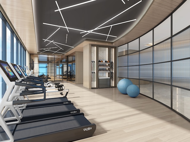 11-36 45th Rd Unit 404A, New York City, NY 11101 - gym featuring wood finished floors and floor to ceiling windows