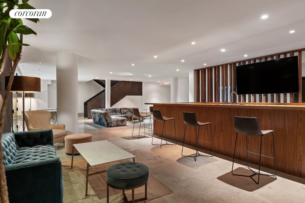 429 Kent Ave Unit D725, New York City, NY 11249 - community bar area featuring recessed lighting and stairway
