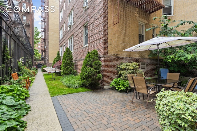 76-12 35th Ave Unit 6J, New York City, NY 11372 - view of patio featuring outdoor dining area