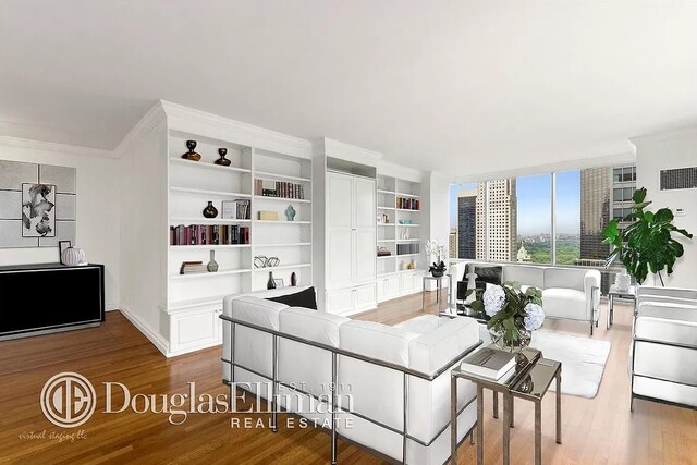 641 5th Ave Unit 35D, New York City, NY 10022 - living area featuring wood finished floors, ornamental molding, and built in features