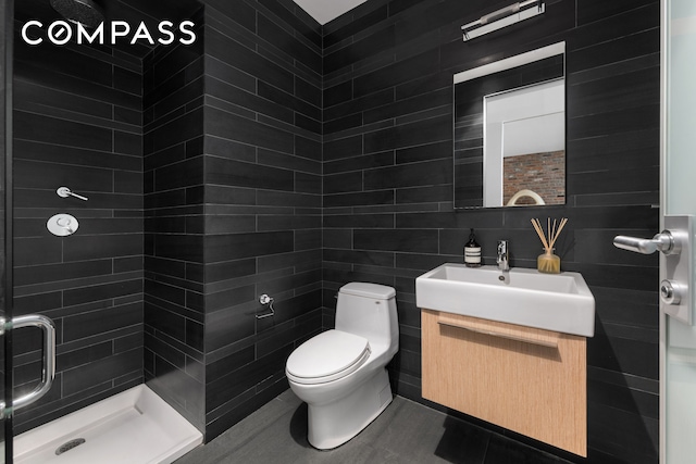 74 Warren St Unit 5W, New York City, NY 10007 - bathroom with vanity, a stall shower, and tile walls