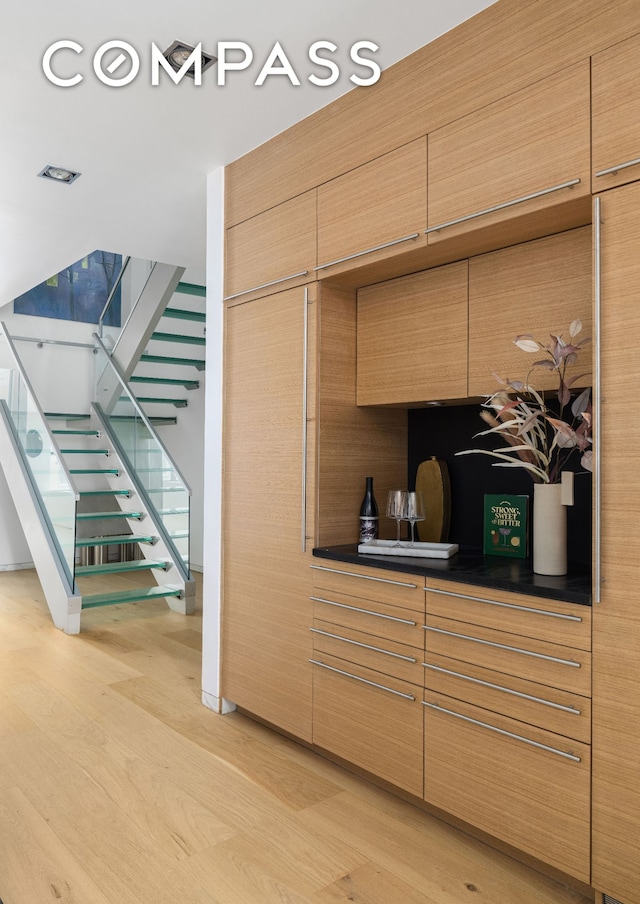 74 Warren St Unit 5W, New York City, NY 10007 - bar with light wood finished floors and stairway