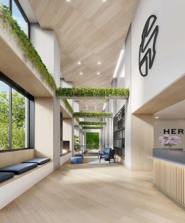 24-16 Queens Plz S Unit 3G, New York City, NY 11101 - building lobby featuring high vaulted ceiling and recessed lighting
