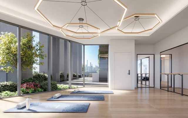 24-16 Queens Plz S Unit 3G, New York City, NY 11101 - exercise room with wood finished floors and plenty of natural light