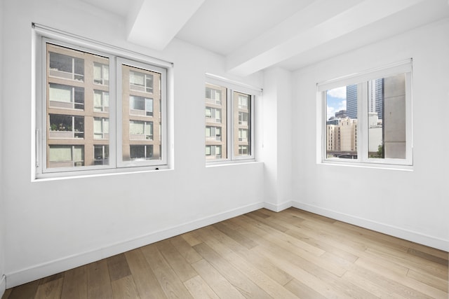 24-16 Queens Plz S Unit 3G, New York City, NY 11101 - spare room with hardwood / wood-style floors