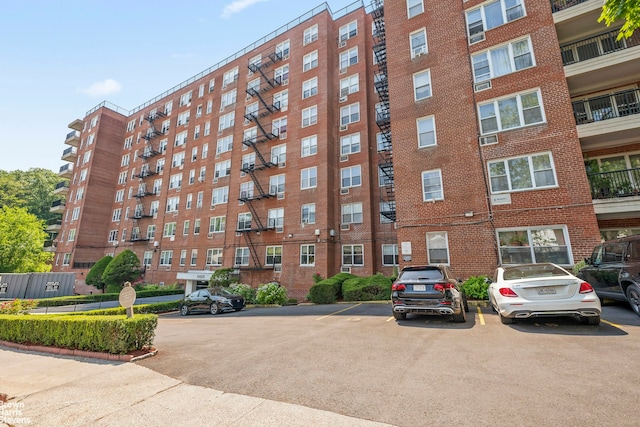 5425 Valles Ave Unit 5G, New York City, NY 10471 - view of apartment building / complex featuring uncovered parking