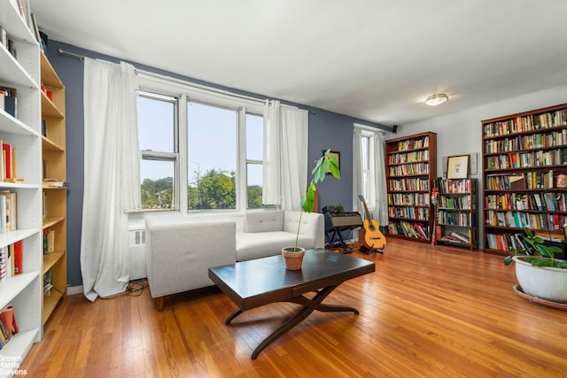 5425 Valles Ave Unit 5G, New York City, NY 10471 - living area with wood finished floors and bookshelves