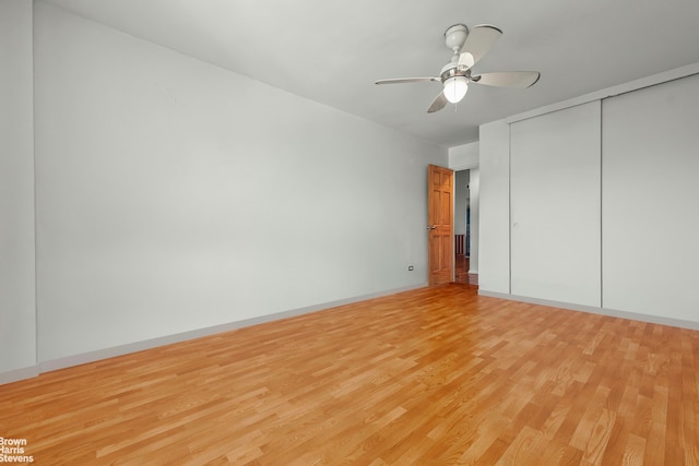 5425 Valles Ave Unit 5G, New York City, NY 10471 - unfurnished bedroom with light wood-type flooring, a closet, and a ceiling fan