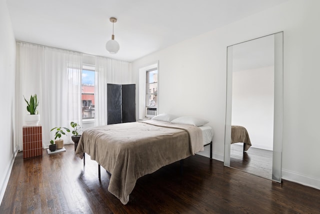 1075 Grand Concourse Unit 1G, New York City, NY 10452 - bedroom featuring dark wood-type flooring and baseboards