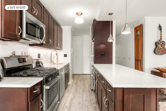 1641 3rd Ave Unit 8K, New York City, NY 10128 - kitchen featuring appliances with stainless steel finishes, light wood-style floors, decorative backsplash, dark brown cabinetry, and crown molding