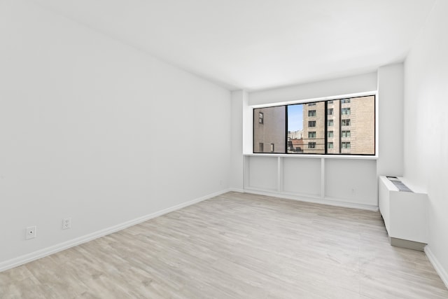 32 E 76th St Unit 605, New York City, NY 10021 - unfurnished room featuring wood finished floors