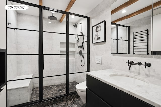 23 Bethune St Garden, Unit Garden, New York City, NY 10014 - bathroom with tile walls, a shower stall, vanity, recessed lighting, and a towel warmer