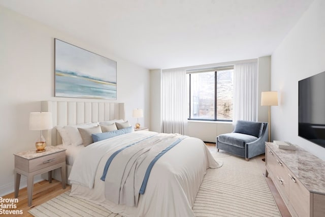 1001 5th Ave Unit 7A, New York City, NY 10028 - bedroom featuring light wood-style flooring