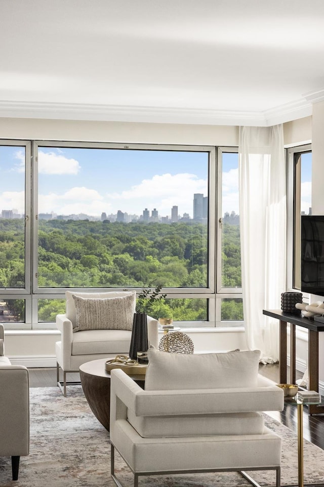 301 W 57th St Unit 16C, New York City, NY 10019 - living area featuring wood finished floors and crown molding