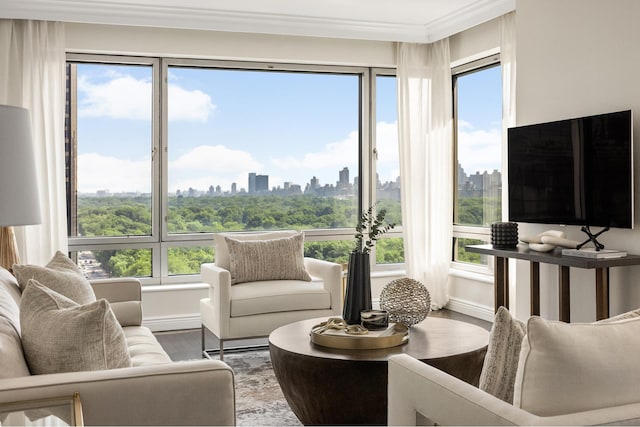 301 W 57th St Unit 16C, New York City, NY 10019 - living room with wood finished floors, plenty of natural light, and crown molding