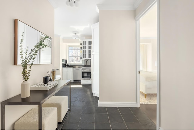 301 W 57th St Unit 16C, New York City, NY 10019 - hall featuring dark tile patterned flooring and crown molding