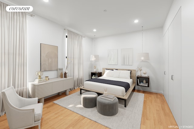 56 Pine St Unit 4C, New York City, NY 10005 - bedroom featuring recessed lighting and light wood-style floors