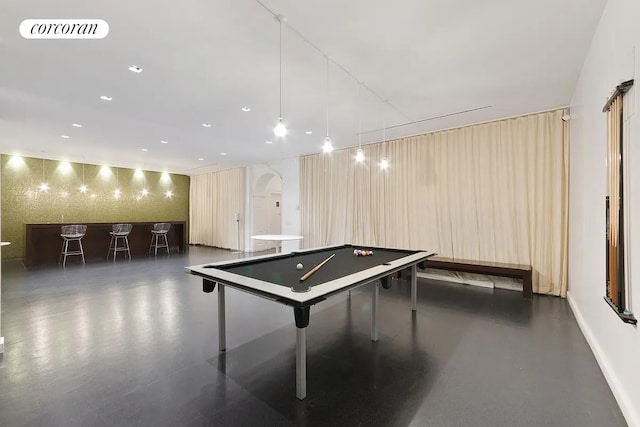 56 Pine St Unit 4C, New York City, NY 10005 - playroom with pool table, arched walkways, concrete floors, and recessed lighting