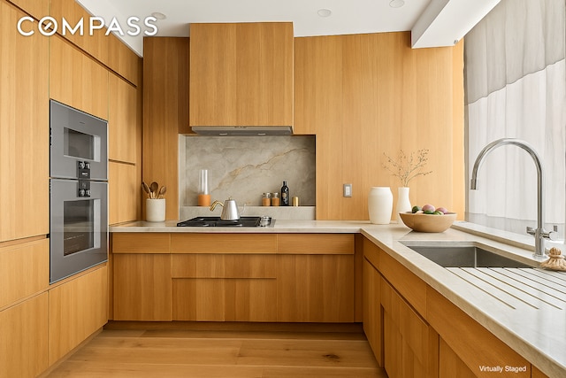 120 Riverside Blvd Unit 10W, New York City, NY 10069 - kitchen featuring modern cabinets, light countertops, and backsplash