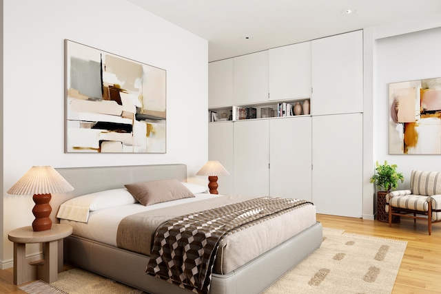 65 Leonard St Unit 3, New York City, NY 10013 - bedroom featuring light wood-type flooring, a closet, and recessed lighting