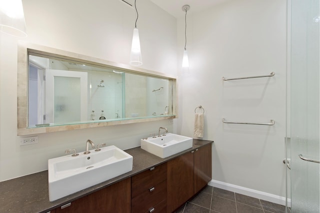 65 Leonard St Unit 3, New York City, NY 10013 - full bathroom featuring a shower stall, double vanity, and tile patterned flooring