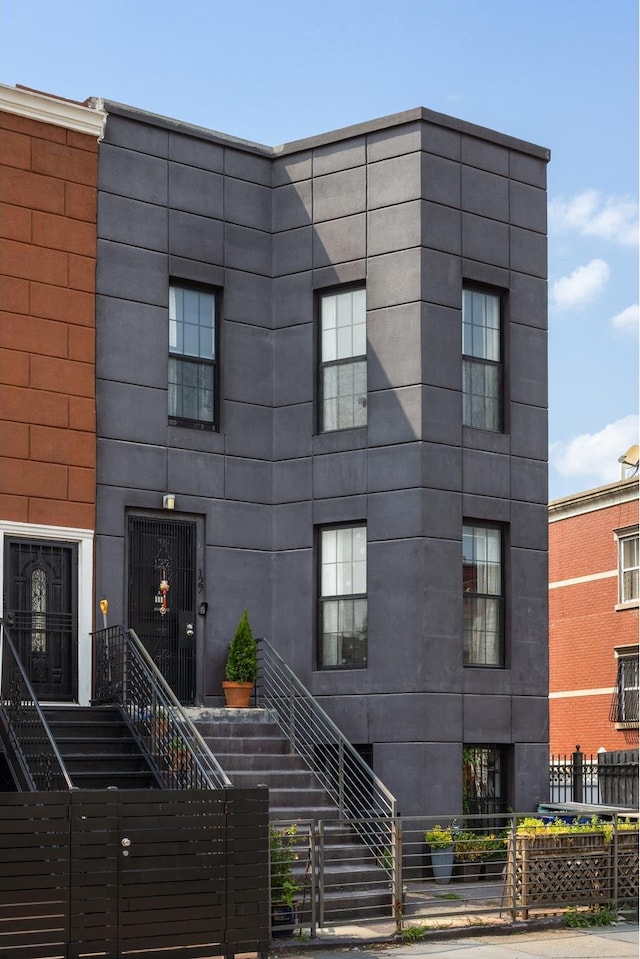127 Cooper St, New York City, NY 11207 - view of front of house featuring stairs