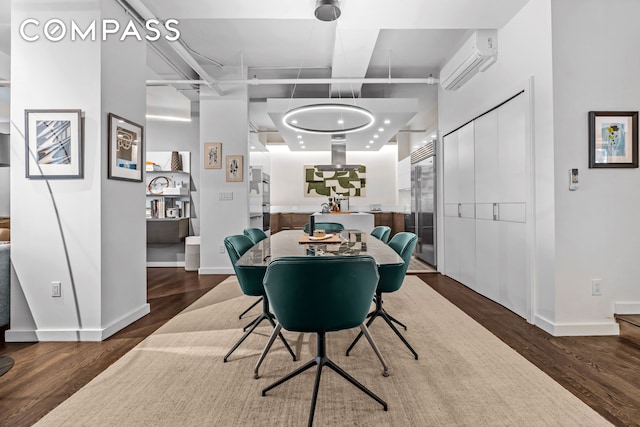 335 W 38th St Unit 6, New York City, NY 10018 - dining space with a wall unit AC and wood finished floors