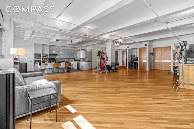 335 W 38th St Unit 6, New York City, NY 10018 - living area featuring light wood-style floors