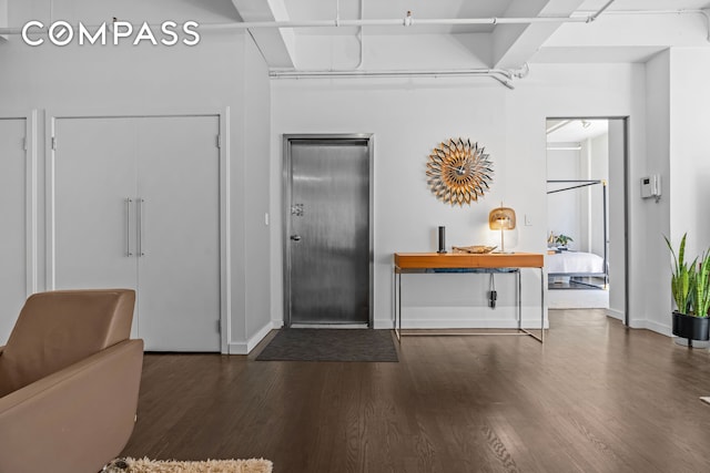 335 W 38th St Unit 6, New York City, NY 10018 - foyer featuring wood finished floors and baseboards