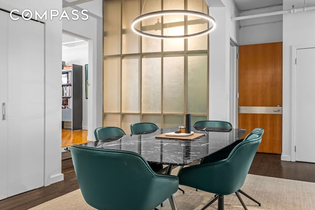 335 W 38th St Unit 6, New York City, NY 10018 - dining space with wood finished floors