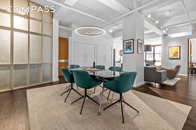 335 W 38th St Unit 6, New York City, NY 10018 - dining area featuring wood finished floors and baseboards