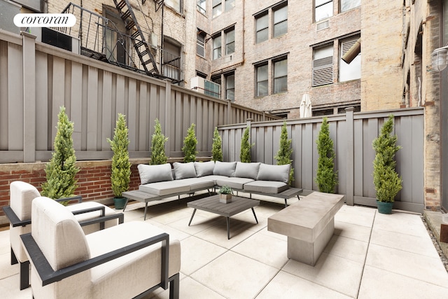 205 E 22nd St Unit 1Ab, New York City, NY 10010 - fenced backyard featuring an outdoor hangout area and a patio