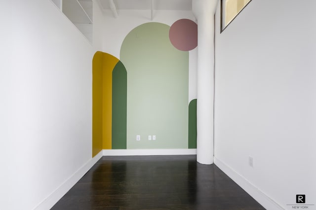 50 Bridge St Unit 506, New York City, NY 11201 - unfurnished room featuring dark wood-type flooring and baseboards