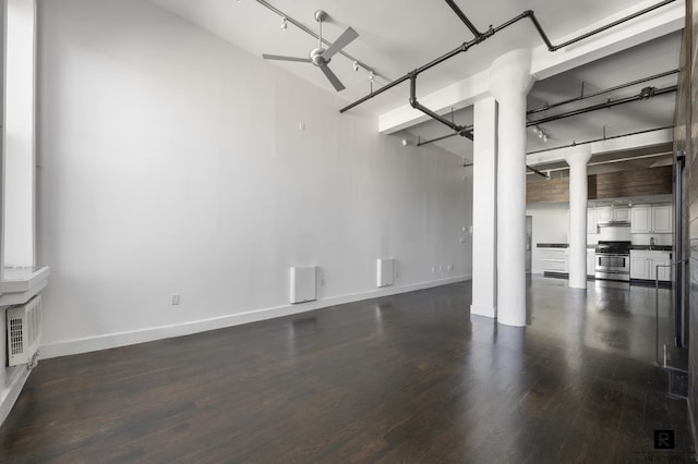 50 Bridge St Unit 506, New York City, NY 11201 - garage with baseboards and a ceiling fan