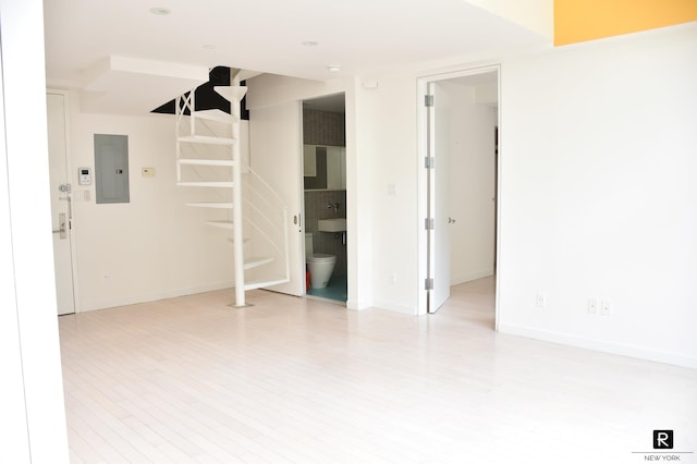 100 N 3rd St Unit 2B/4P, New York City, NY 11249 - unfurnished room featuring electric panel and light wood-style flooring