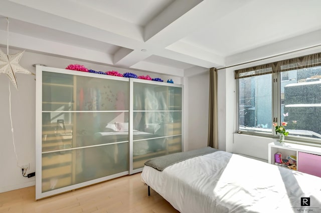 100 N 3rd St Unit 2B/4P, New York City, NY 11249 - bedroom with wood finished floors, beam ceiling, and coffered ceiling