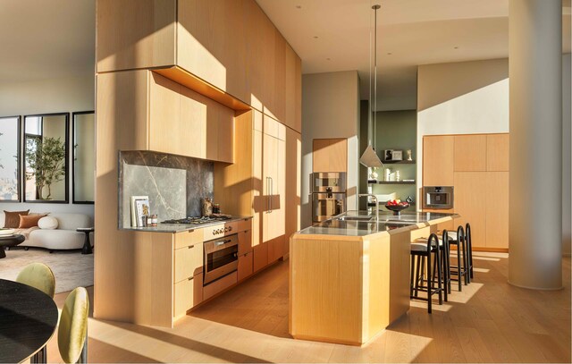 30 Front St Pha, Pha, New York City, NY 11201 - kitchen featuring modern cabinets, stainless steel appliances, and a kitchen bar