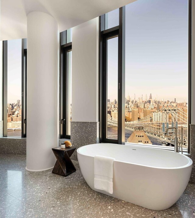 30 Front St Pha, Pha, New York City, NY 11201 - bathroom with a freestanding tub, speckled floor, and a view of city