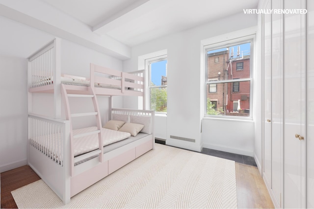 164 W 79th St Unit 4Ab, New York City, NY 10024 - bedroom with wood finished floors and beamed ceiling